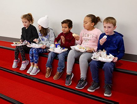 kids eating breakfast in gym