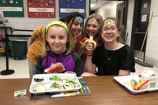 middle school girls eating lunch