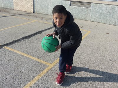 Boy Posing with Basketball