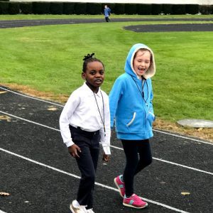 Girls Walking on Track