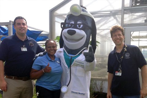 Mascot Posing With Staff