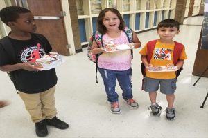 Kids Holding Lunch Trays