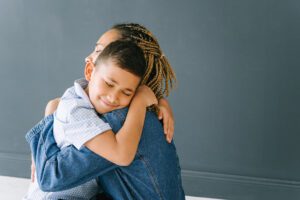 child gets a hug