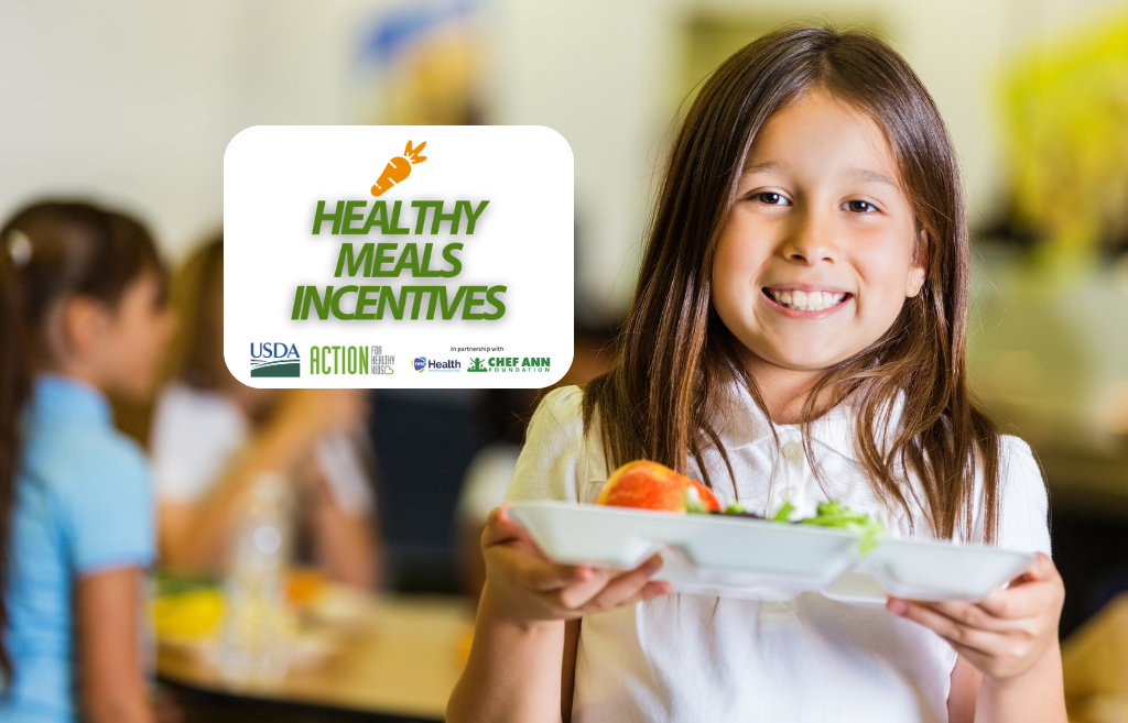 girl holding a lunch tray